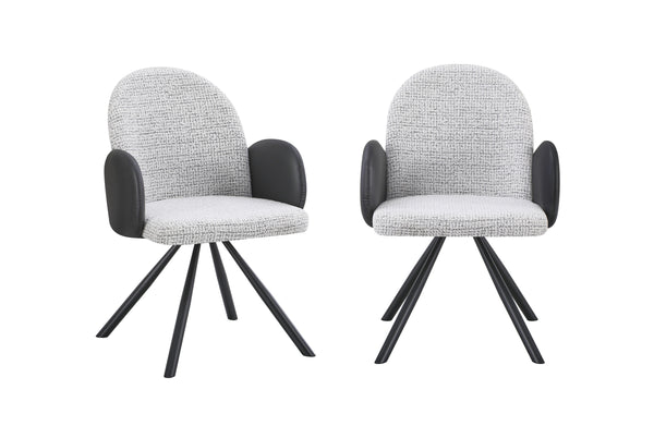 Black and white swivel dining chair with arms creating bold contemporary style and comfort
