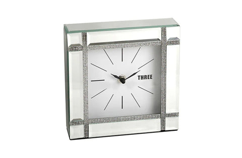 Elegant small mirror table clock with faux crystal accents and beveled edges.