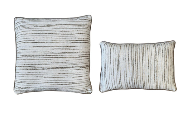Neutral cushions in beige and brown tones with textured jacquard design
