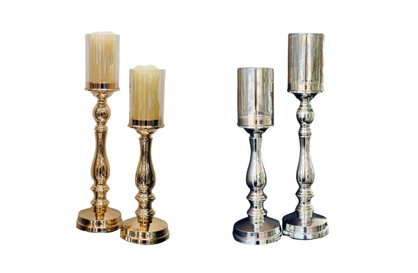 Silver and gold mixed pillar candle holder set with reflective surface and classic sculpted design, perfect for adding a luxurious touch to interiors