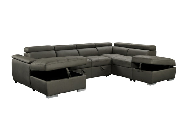 Plush modular chaise lounge in charcoal grey with pull-out bed, storage ottoman, and headrests.