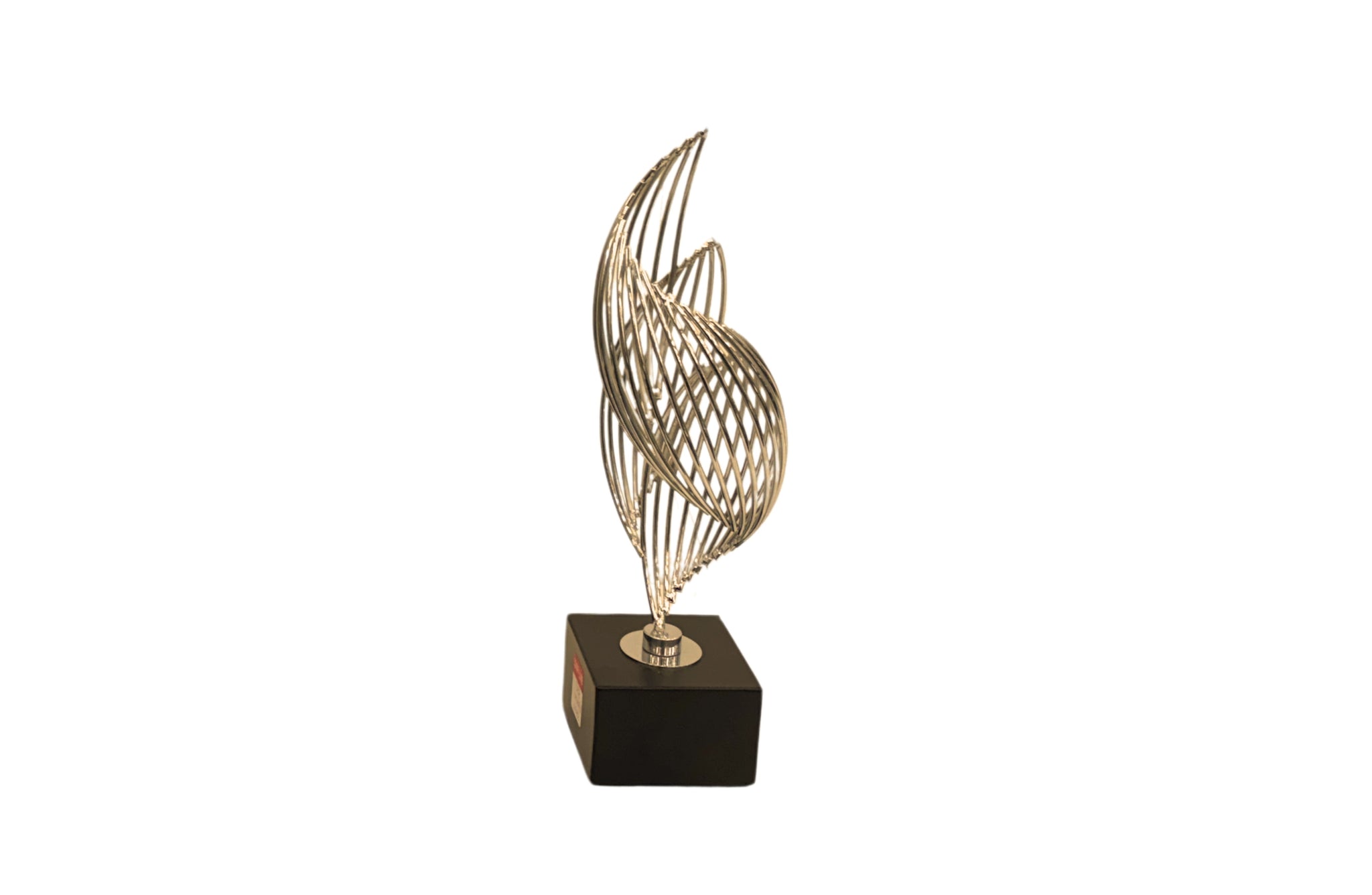  Small gold Ribbon Table Décor with a black base – compact and graceful with a sculptural twisted design.