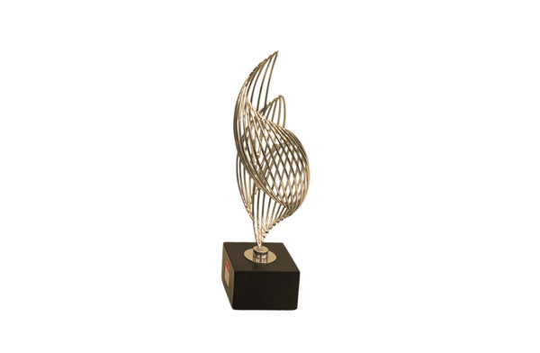  Small gold Ribbon Table Décor with a black base – compact and graceful with a sculptural twisted design.
