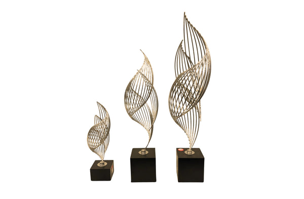 Set of 3 gold Ribbon Table Décor pieces with black bases – featuring elegant, twisted metallic designs in small, medium, and large sizes.