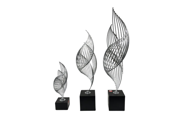 Trio of Ribbon Table Décor sculptures in black and silver finish, displayed in small, medium, and large sizes on black bases with an artistic twisted metal design.