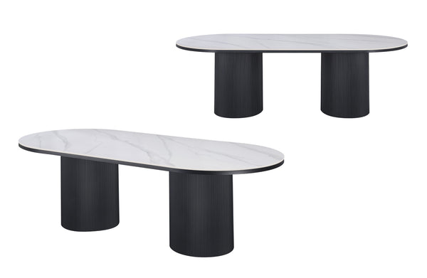 White marble oval dining table with black fluted base creating bold modern luxury centrepiece