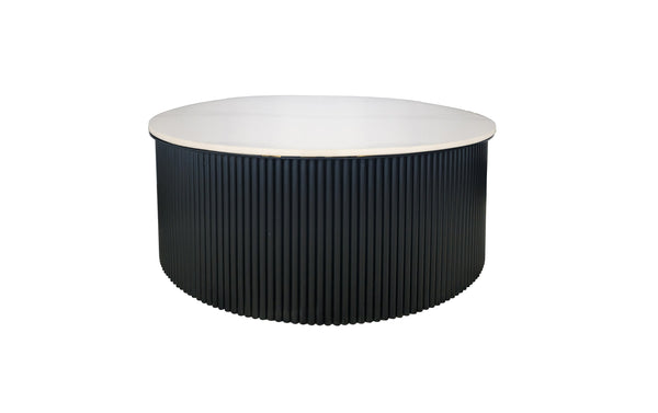 Ripple round black coffee table with ribbed base and white marble top