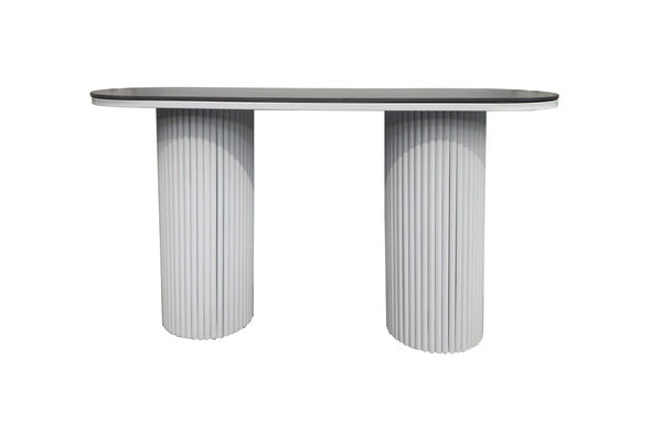 Ripple console table with black sintered stone marble top and white fluted legs.