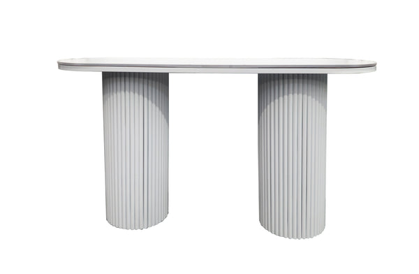 Ripple console table with white marble top and white fluted legs.