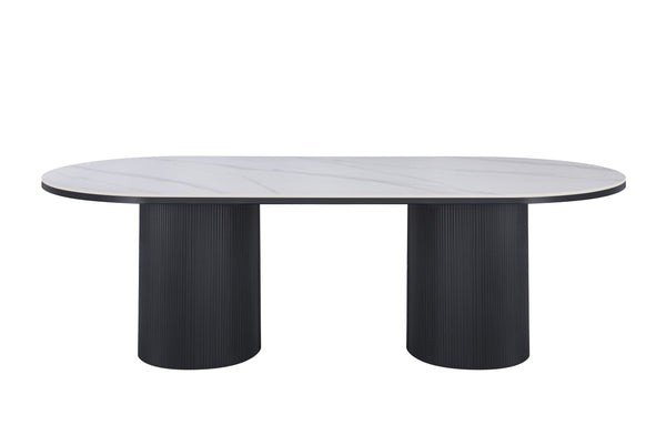 Ripple Oval Dining Table with white marble top and black base in modern style.