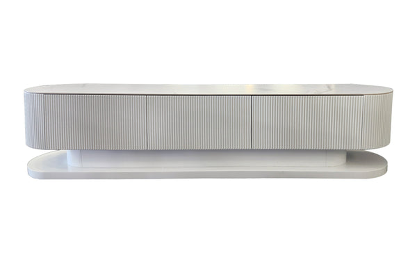 Sleek white entertainment TV cabinet with ripple detailing and matching white stone top