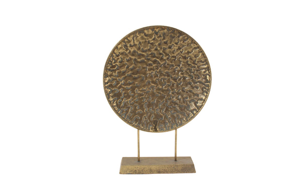 Stylish gold round pressed table décor with textured finish for modern interiors.