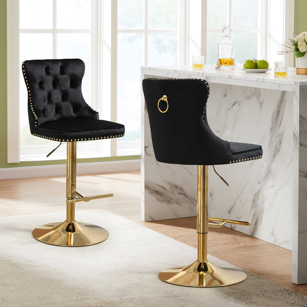 Black velvet Sahara swivel bar stools with gold stand styled in modern kitchen bar setting