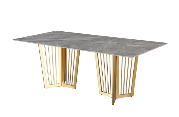 Serena Dining Table gold stainless frame with sophisticated grey marble top and modern design.