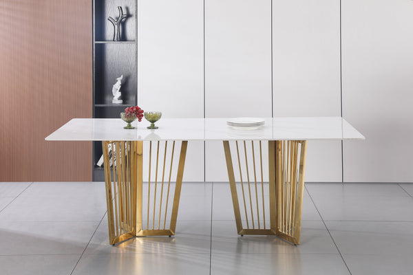 Serena Dining Table gold stainless frame with sophisticated marble top and modern design.