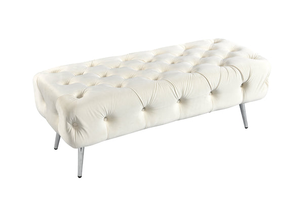 Beige Shirley Ottoman with silver frame and tufted velvet seat for modern elegance