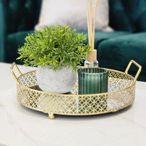 Decorative Tegan tray in gold, styled for elegant modern interiors.