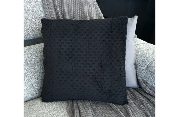 Black Velvet Bubble Cushion styled on sofa, soft textured velvet pillow for modern luxury décor