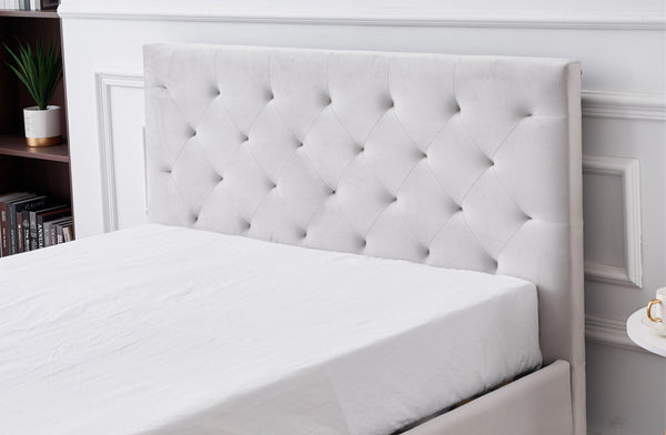 Detailed headboard view of Winston Velvet Bed in light grey with button-tufted finish.