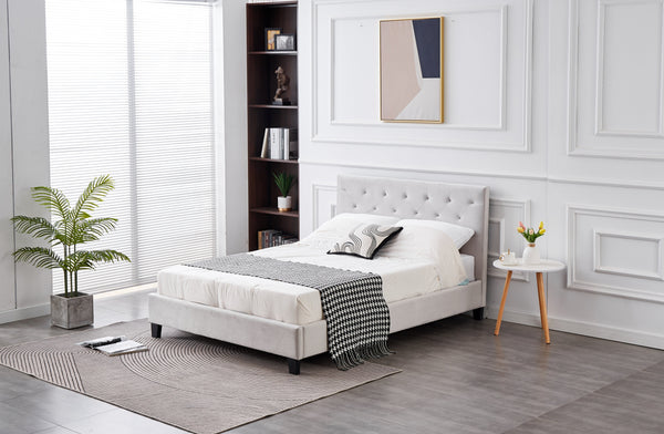 Winston Velvet Tufted Bed in light grey styled in a modern elegant bedroom.